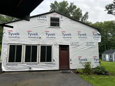 Everlast composite siding in deep slate blue on an Acton, MA home - photo 35