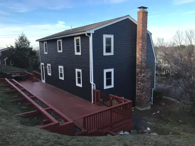 Charcoal CertainTeed vinyl siding on a gambrel Dutch colonial in Danvers, MA - photo 6