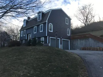 Charcoal CertainTeed vinyl siding on a gambrel Dutch colonial in Danvers, MA - photo 10