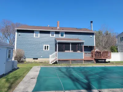 Slate blue James Hardie lap and shingle siding on a home in Maynard, MA - photo 6
