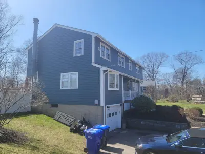 Slate blue James Hardie lap and shingle siding on a home in Maynard, MA - photo 9