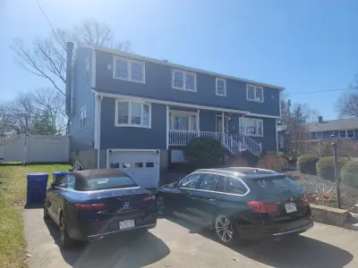 Slate blue James Hardie lap and shingle siding on a home in Maynard, MA - photo 10
