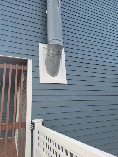 Slate blue James Hardie lap and shingle siding on a home in Maynard, MA - photo 13