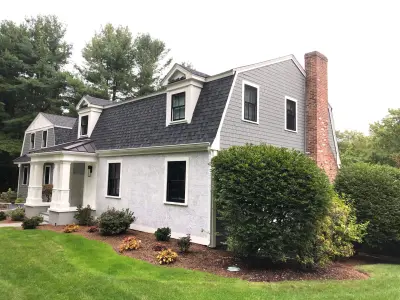 Gray James Hardie shingle siding with white trim on a gambrel home in Needham, MA - photo 35