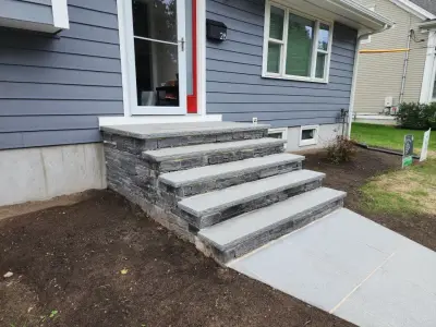 Chimney side elevation with new lap siding and exposed poured foundation