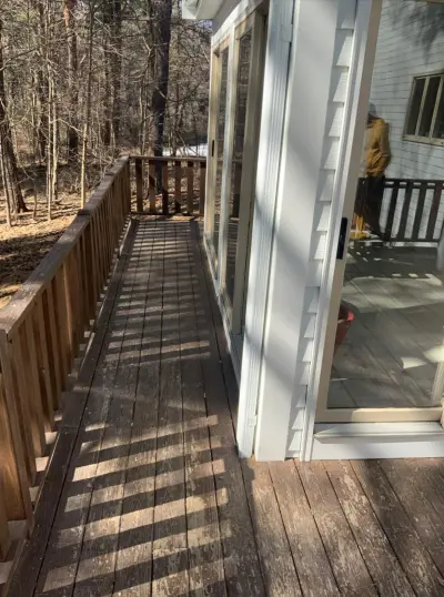 James Hardie white lap siding with black shutters in Sudbury, MA