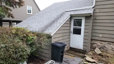 Deep navy James Hardie lap siding with white trim in Worcester, MA - photo 25
