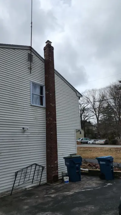 CertainTeed blue vinyl siding and new windows on a raised ranch in Canton, MA - photo 8