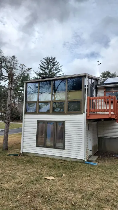 CertainTeed blue vinyl siding and new windows on a raised ranch in Canton, MA - photo 14