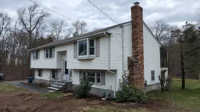 CertainTeed blue vinyl siding and new windows on a raised ranch in Canton, MA - photo 19