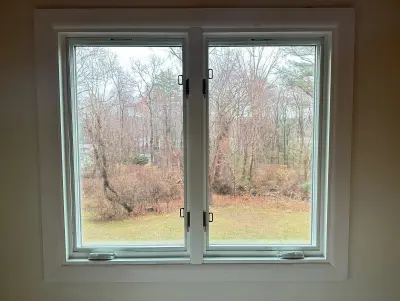 New Harvey casement windows with stained wood interior trim in Framingham, MA - photo 5