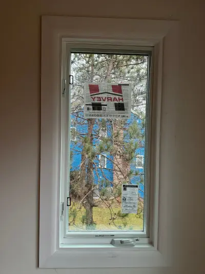 New Harvey casement windows with stained wood interior trim in Framingham, MA - photo 6