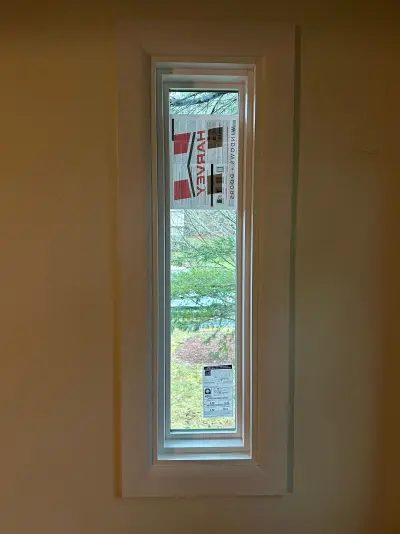 New Harvey casement windows with stained wood interior trim in Framingham, MA - photo 7