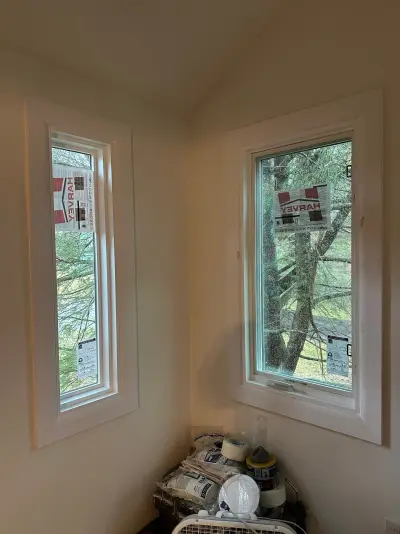 New Harvey casement windows with stained wood interior trim in Framingham, MA - photo 8
