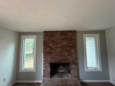 New Harvey casement windows with stained wood interior trim in Framingham, MA - photo 9