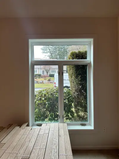 New Harvey casement windows with stained wood interior trim in Framingham, MA - photo 15