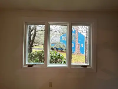 New Harvey casement windows with stained wood interior trim in Framingham, MA - photo 17