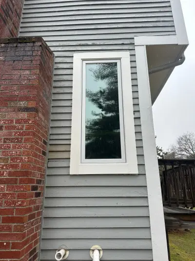 New Harvey casement windows with stained wood interior trim in Framingham, MA - photo 20