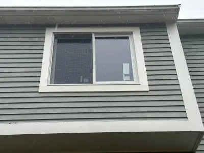 New Harvey casement windows with stained wood interior trim in Framingham, MA - photo 21
