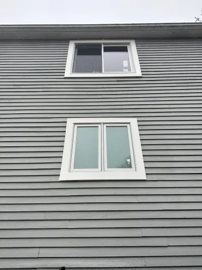 New Harvey casement windows with stained wood interior trim in Framingham, MA - photo 22