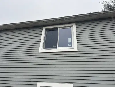 New Harvey casement windows with stained wood interior trim in Framingham, MA - photo 23