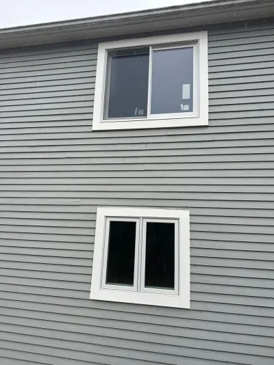 New Harvey casement windows with stained wood interior trim in Framingham, MA - photo 25