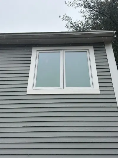 New Harvey casement windows with stained wood interior trim in Framingham, MA - photo 27