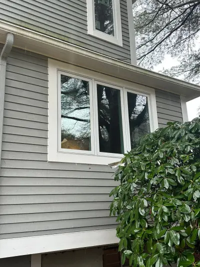 New Harvey casement windows with stained wood interior trim in Framingham, MA - photo 33