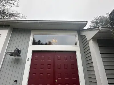 New Harvey casement windows with stained wood interior trim in Framingham, MA - photo 36