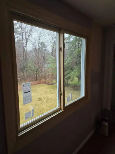New Harvey casement windows with stained wood interior trim in Framingham, MA - photo 43