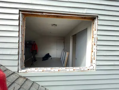 New Harvey casement windows with stained wood interior trim in Framingham, MA - photo 45