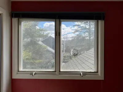 New Harvey casement windows with stained wood interior trim in Framingham, MA - photo 49