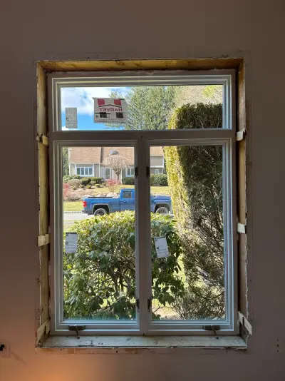 New Harvey casement windows with stained wood interior trim in Framingham, MA - photo 51