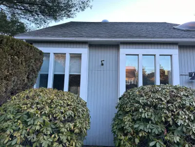 New Harvey casement windows with stained wood interior trim in Framingham, MA - photo 55