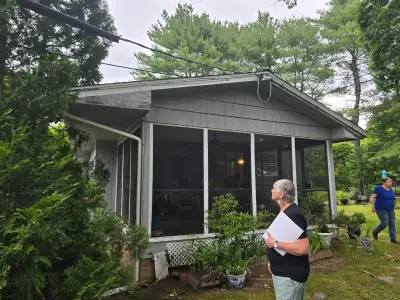 Rigid foam insulation board and new windows installed before siding on a ranch home - photo 40