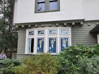 Warm white clapboard home with new windows and gray shingle roof in Wellesley, MA - photo 31