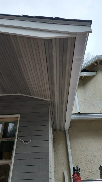 Light greige lap siding installation with black windows in Wellesley, MA - photo 14