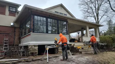 Light greige lap siding installation with black windows in Wellesley, MA - photo 17