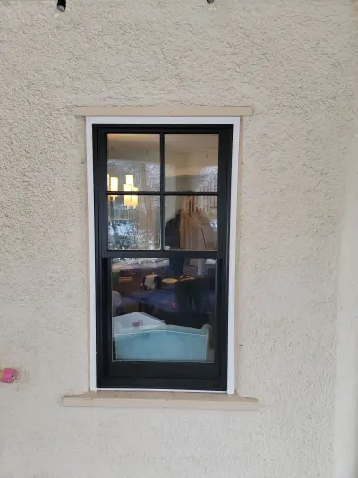Light greige lap siding installation with black windows in Wellesley, MA - photo 22