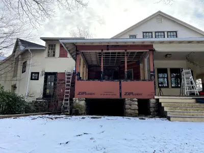 Light greige lap siding installation with black windows in Wellesley, MA - photo 33