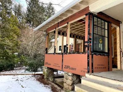Light greige lap siding installation with black windows in Wellesley, MA - photo 34