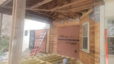 Light greige lap siding installation with black windows in Wellesley, MA - photo 41