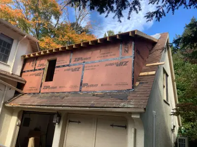 Light greige lap siding installation with black windows in Wellesley, MA - photo 51