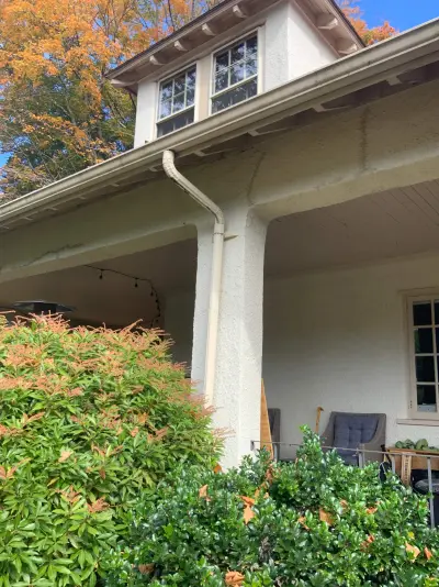Light greige lap siding installation with black windows in Wellesley, MA - photo 56